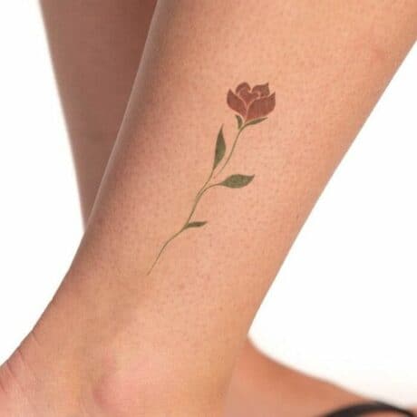 Simple rose tattoo on the left hand - Tattoogrid.net