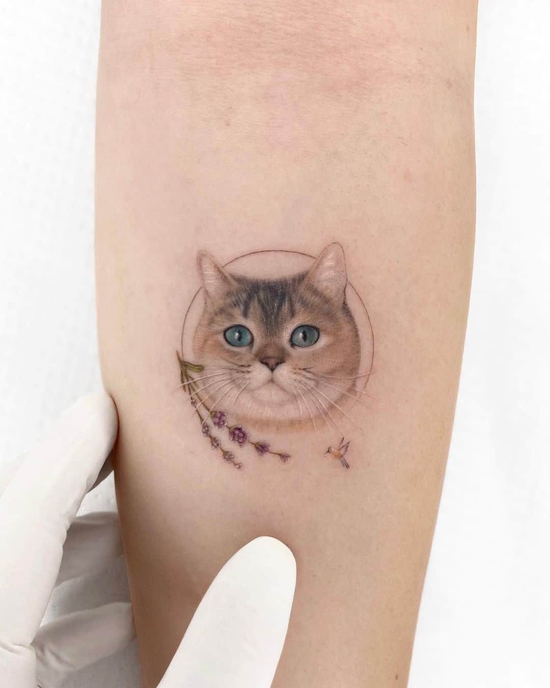 Small cat tattoo design by mustafaalakoc