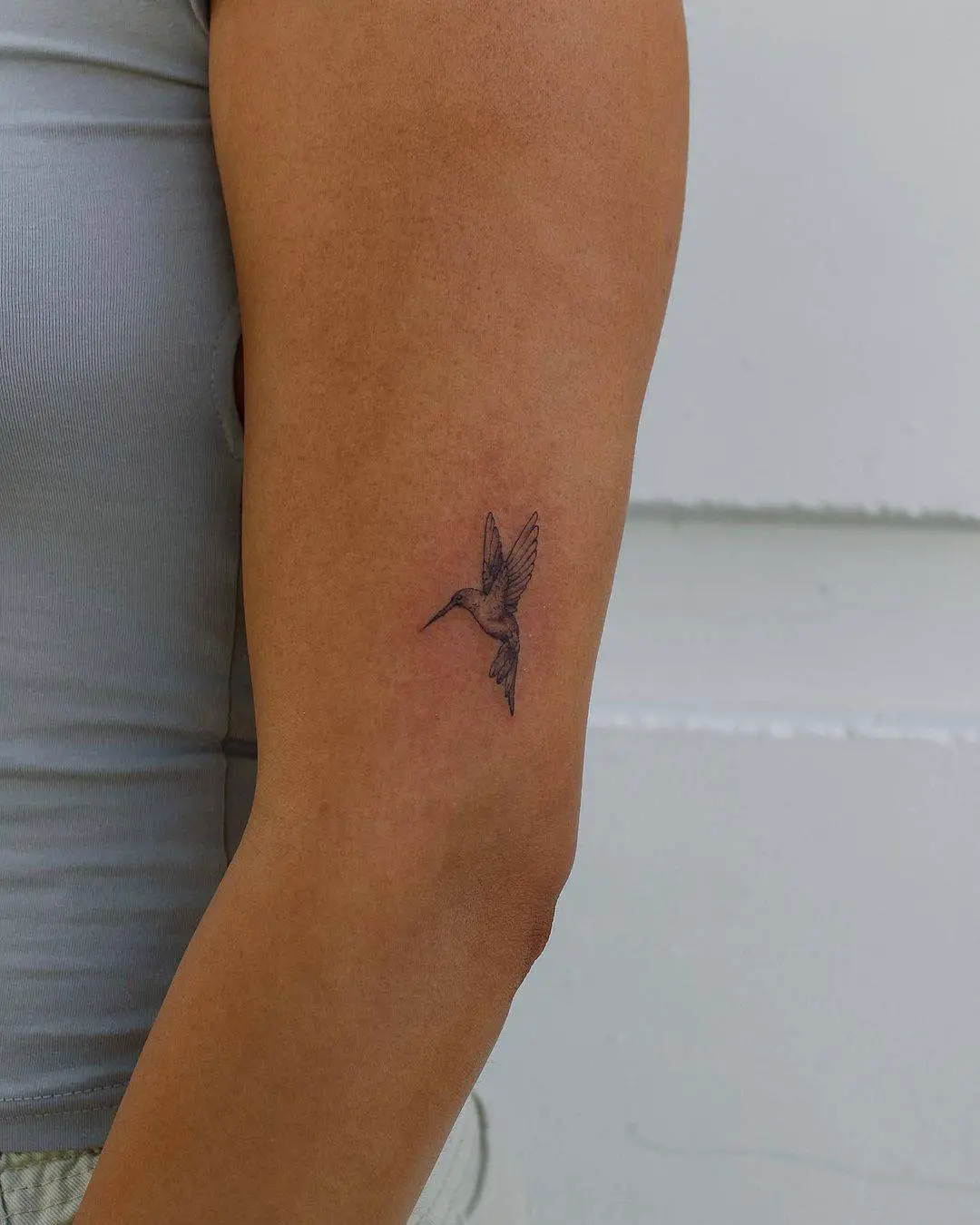 Small humming bird tattoo design by vibetattoo.ut