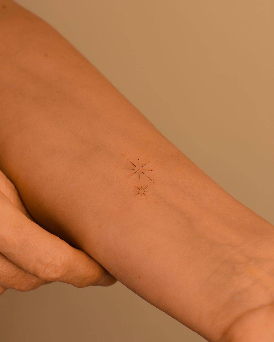 Star tattoo design by gwen.tattooing