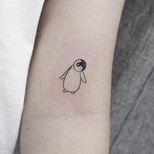 Unique penguin tattoo1