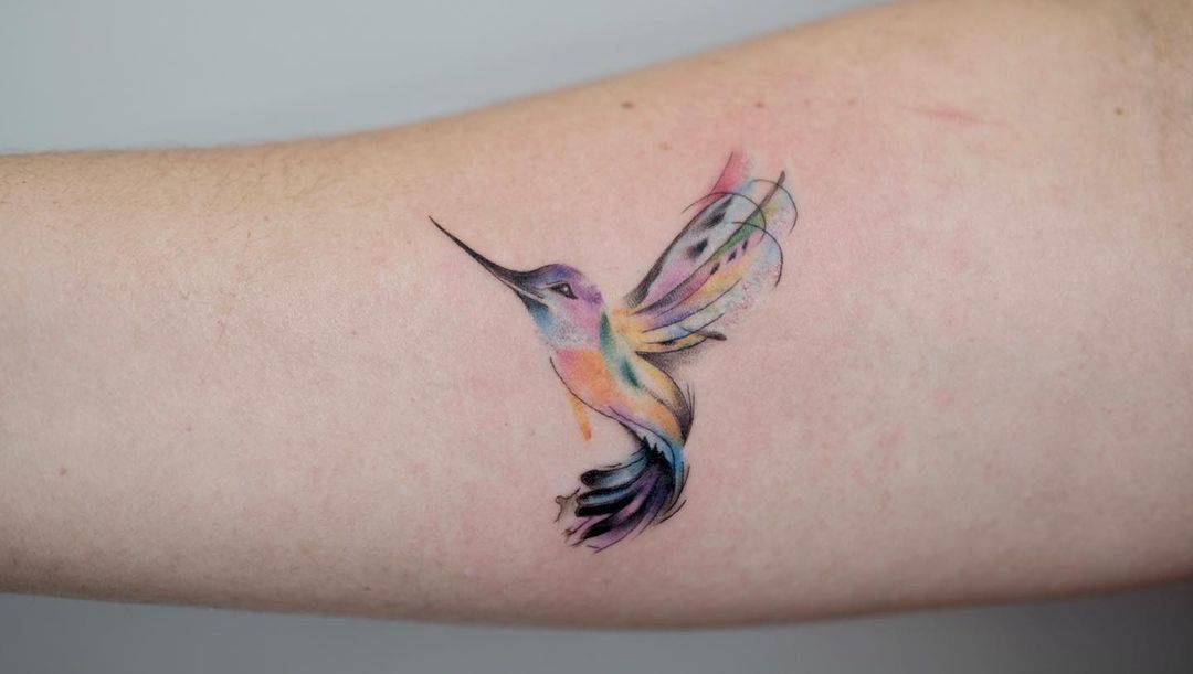 Watercolor bird tattoo by zoetattoo123