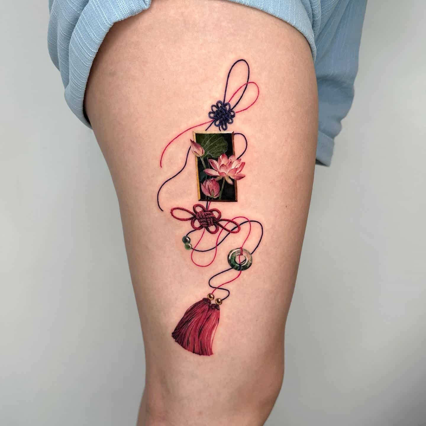 Watercolor lotus tattoo by tattooist coldy