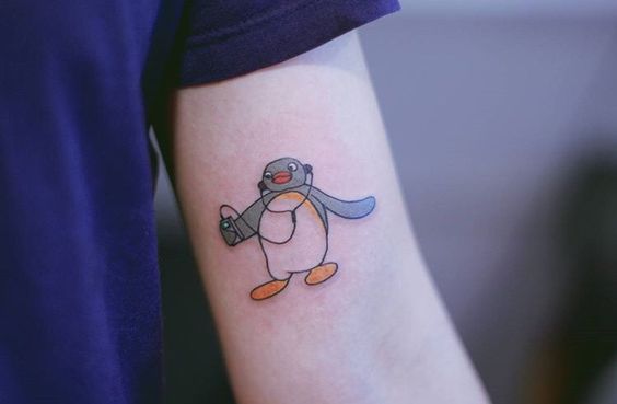 Watercolor penguin tattoo 1