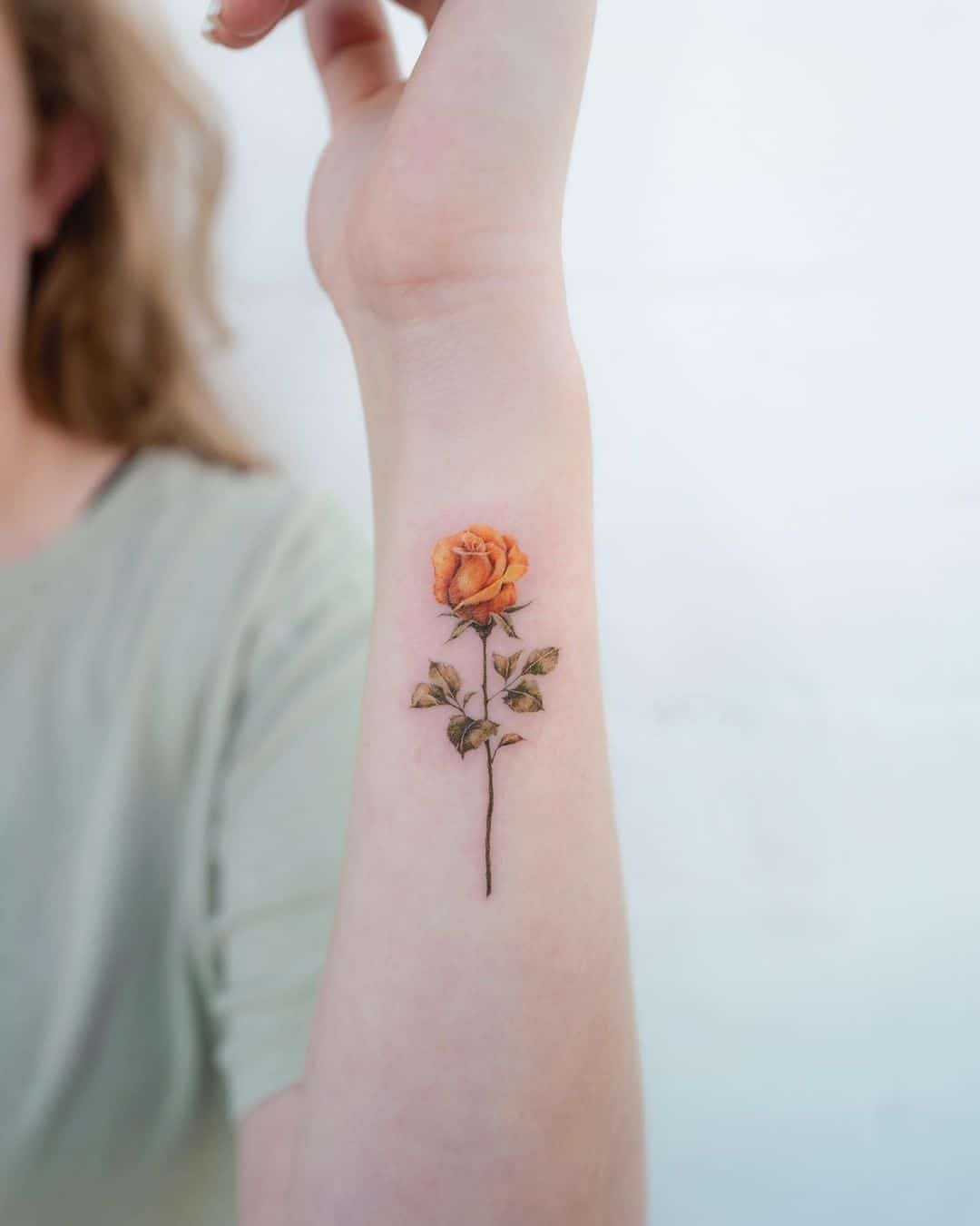 Yellow rose tattoo design by donghwa tattoo