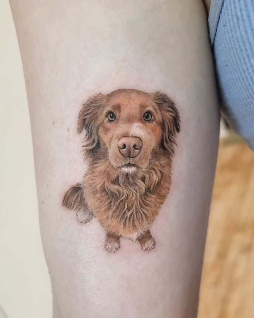 realistic dog tattoo by tattooist sazin