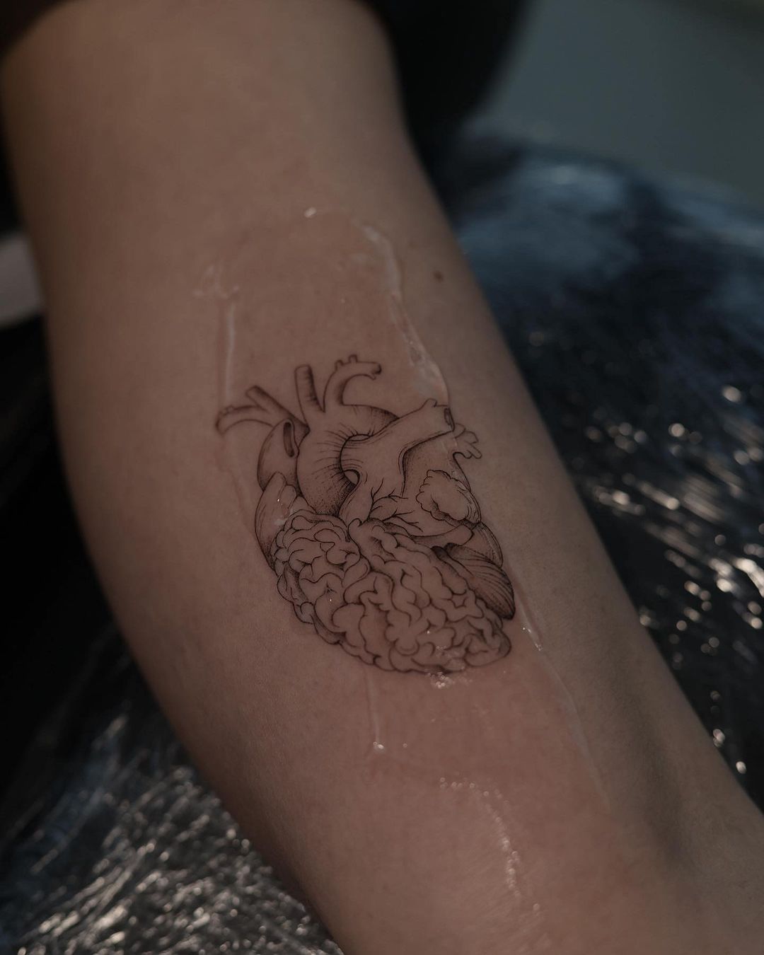 Fineline heart tattoo design by akkurat tattoo