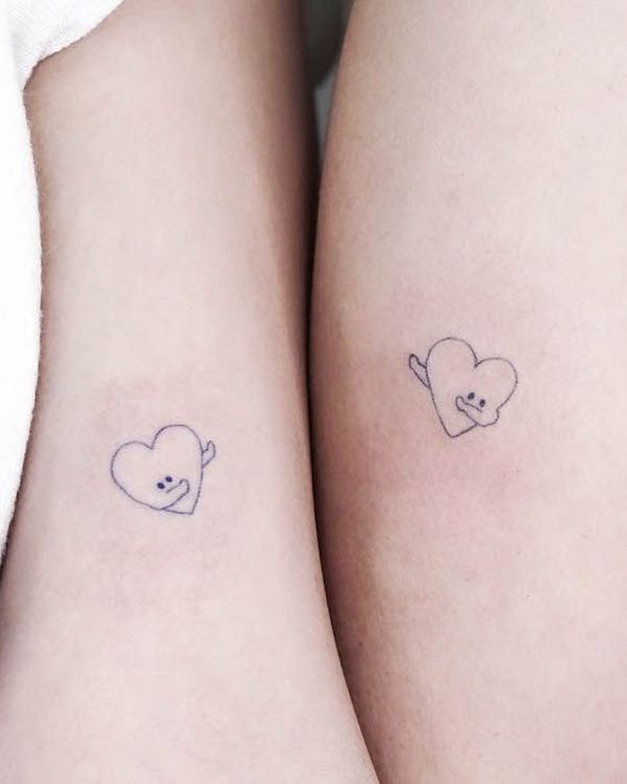 Matching heart tattoo 1