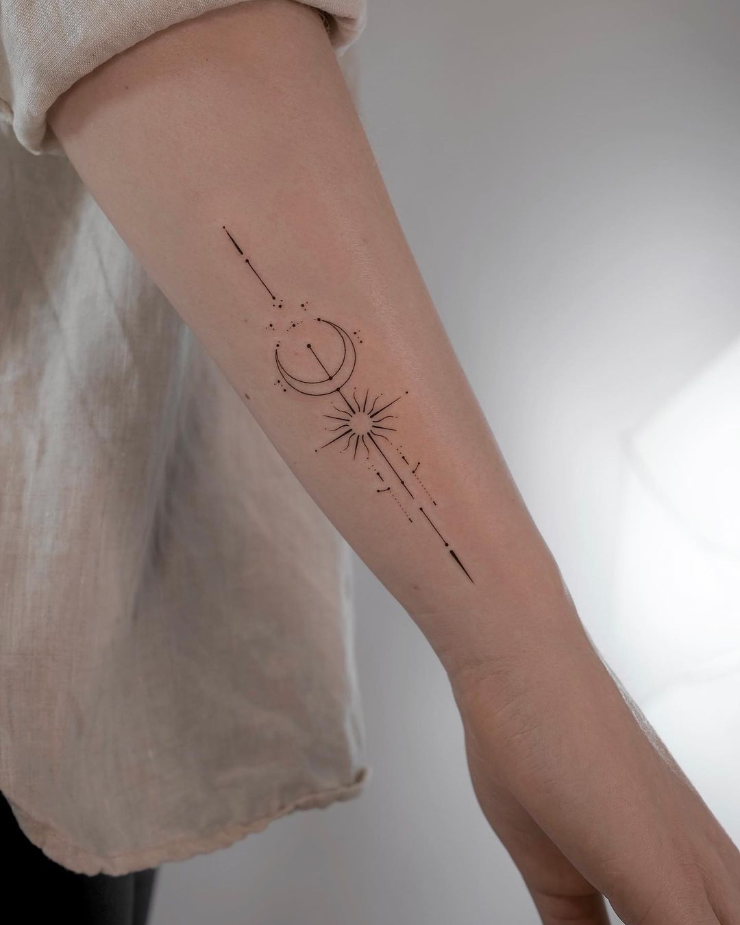Mini sun and moon tattoo design by monochrom.ink