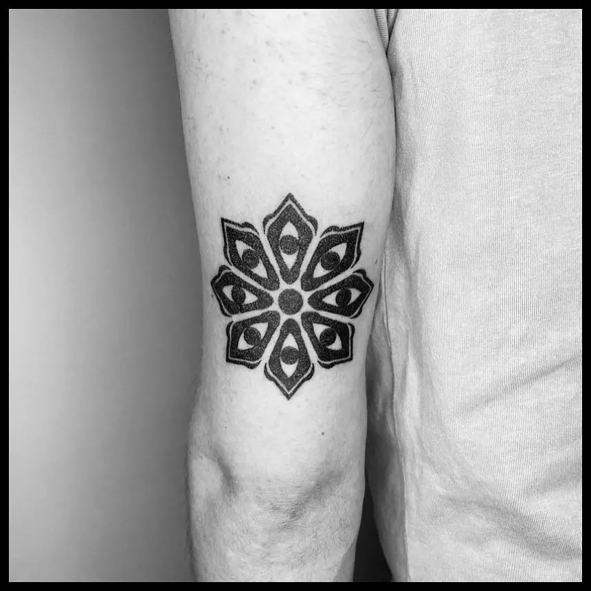 Ornamental flower tattoo by noir.gent