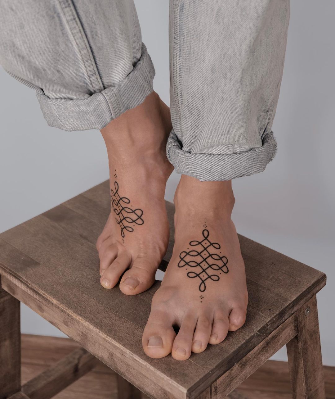 Ornamental foot tattoo by dasha lobachova