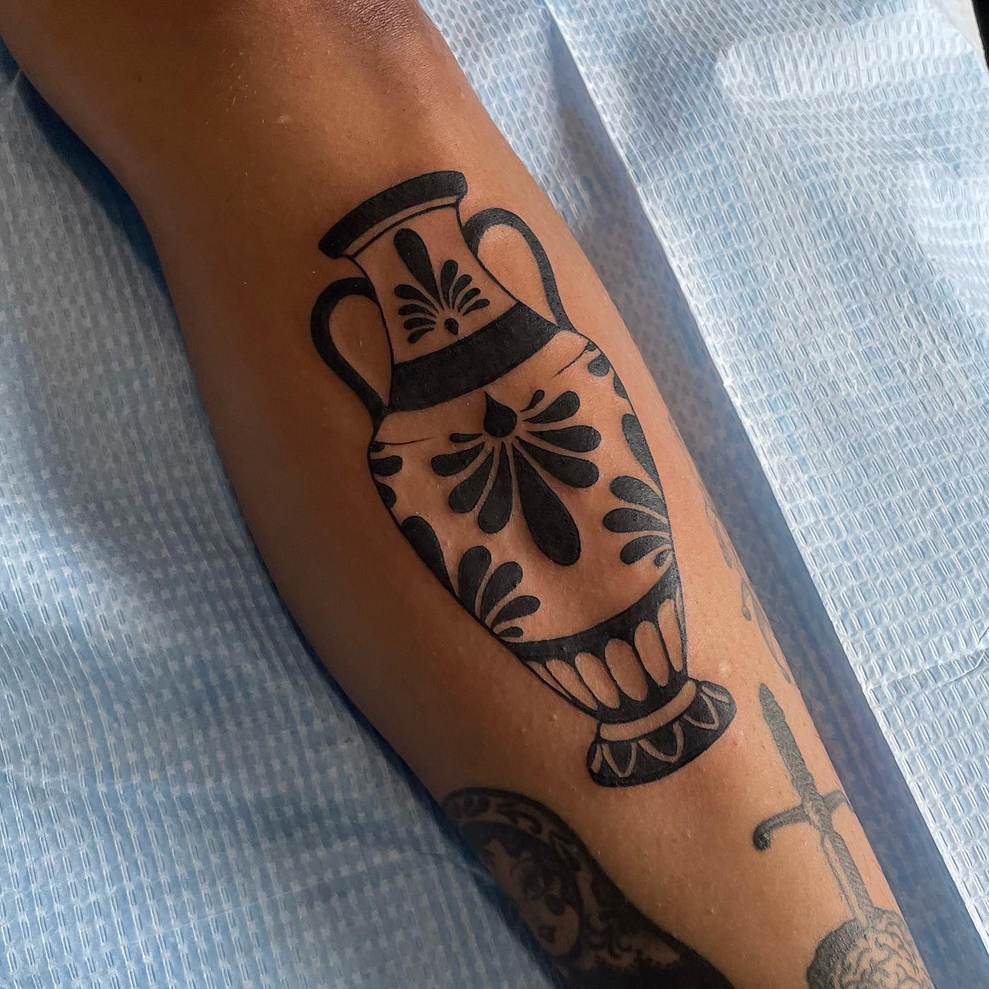 Small ornamental leg tattoo b y nicv.tattoos