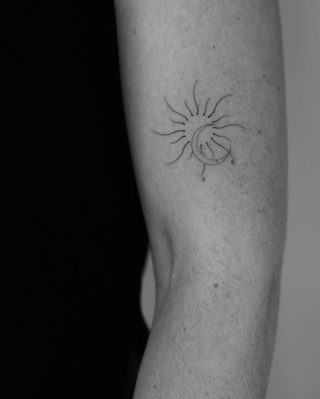 Sun and moon tattoo design by