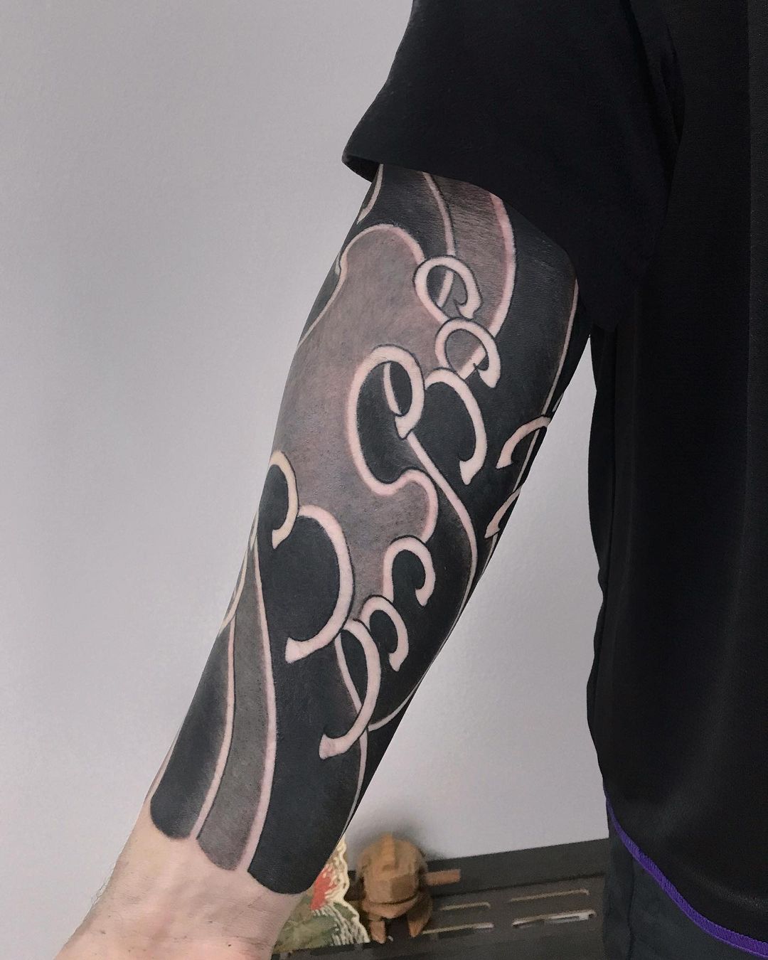 Waves forearm tattoo design