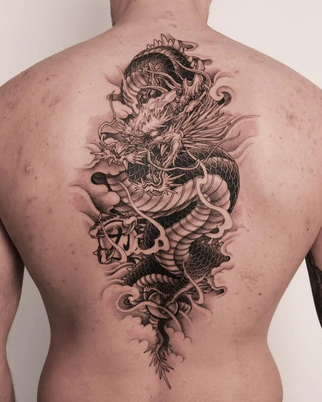 dragon back tattoo by owall tattoo