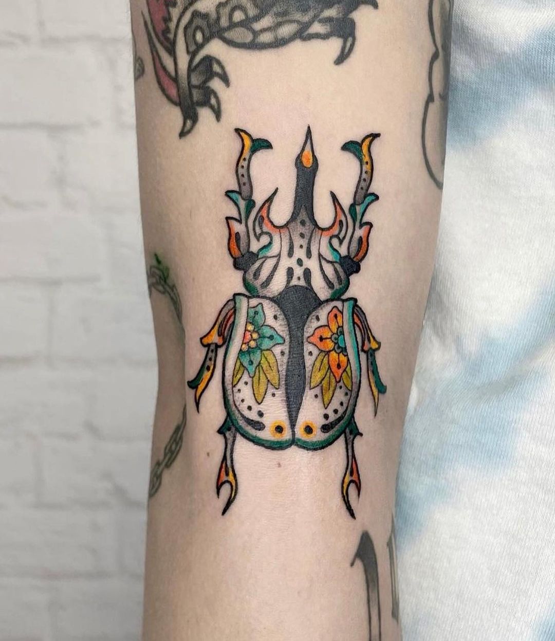 Beetle tattoo designs for women by tribetattoodenver