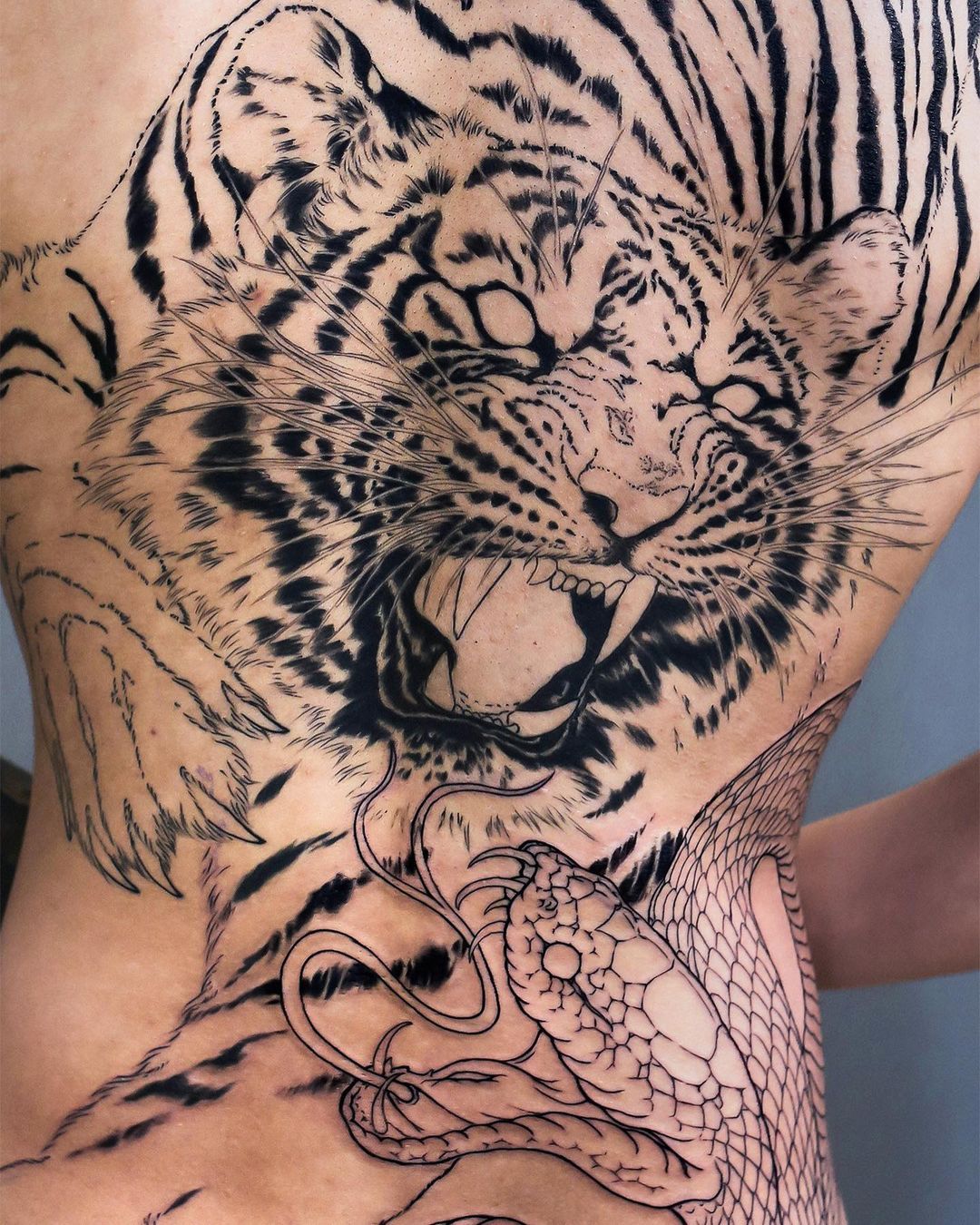 Black inked tiger tattoo by kenji shigehara yktattoo