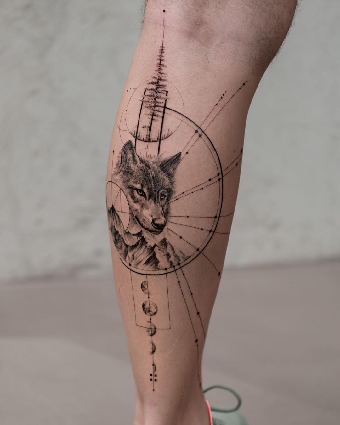 Black inked wolf tattoo by ulassyesilyurt