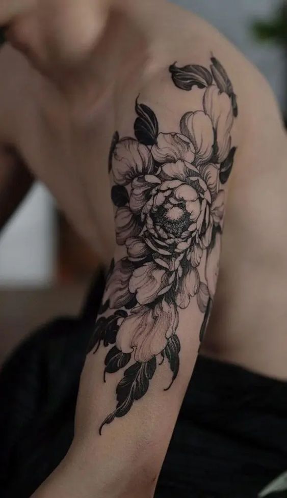 Blackwork flower tattoo