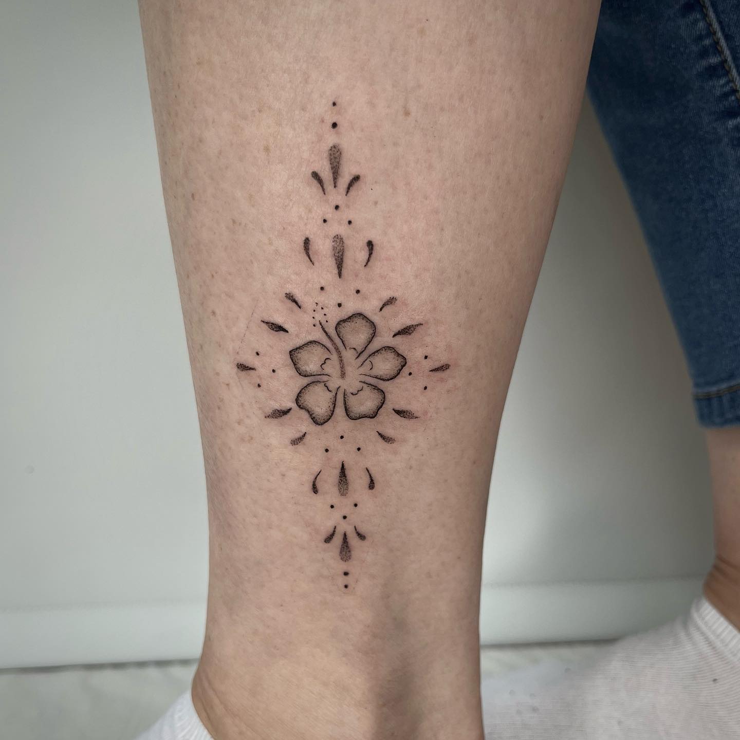 Blackwork flower tattoos by rudi hopkins tattoo