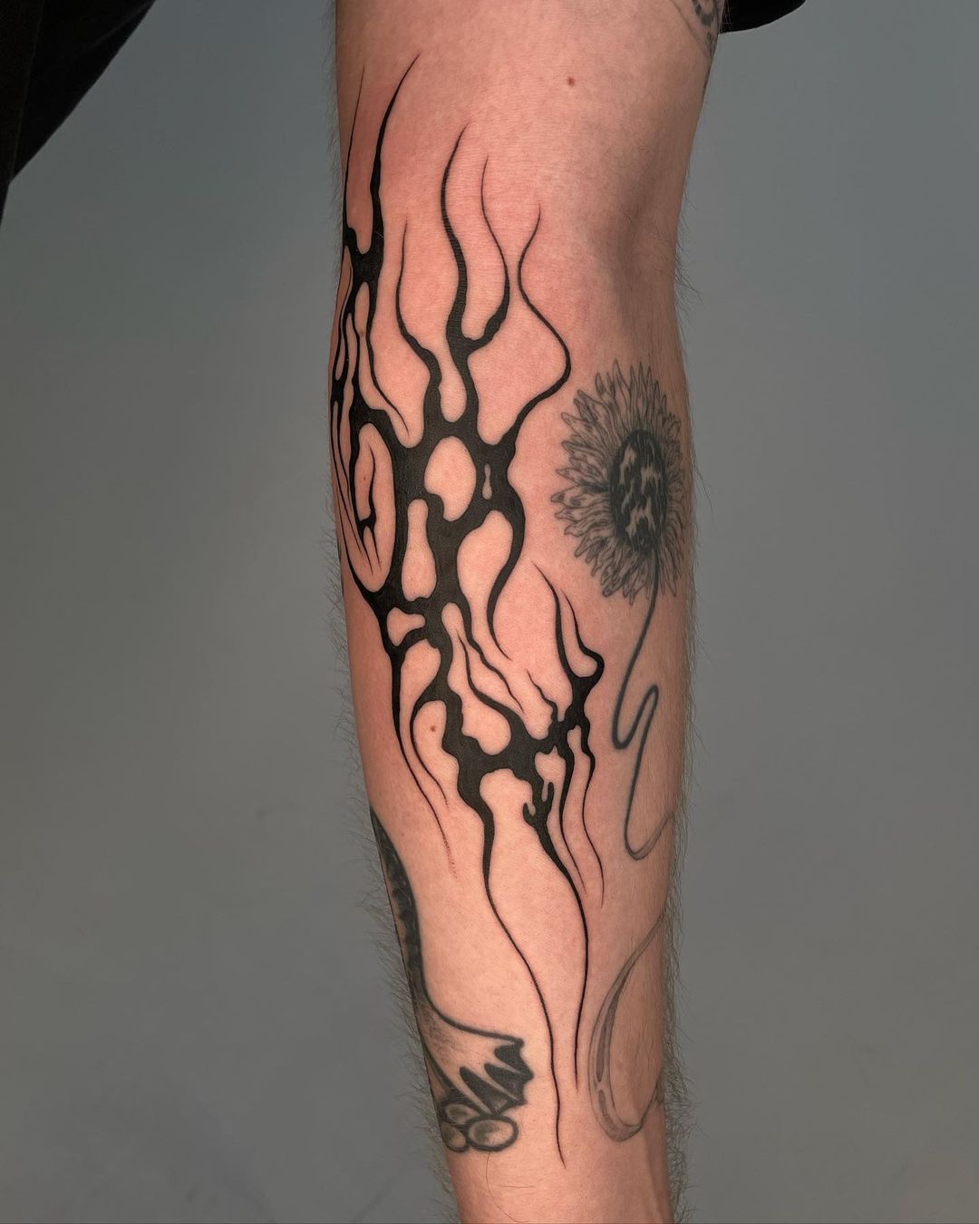 Blackwork tattoo on forearm by carolineraer
