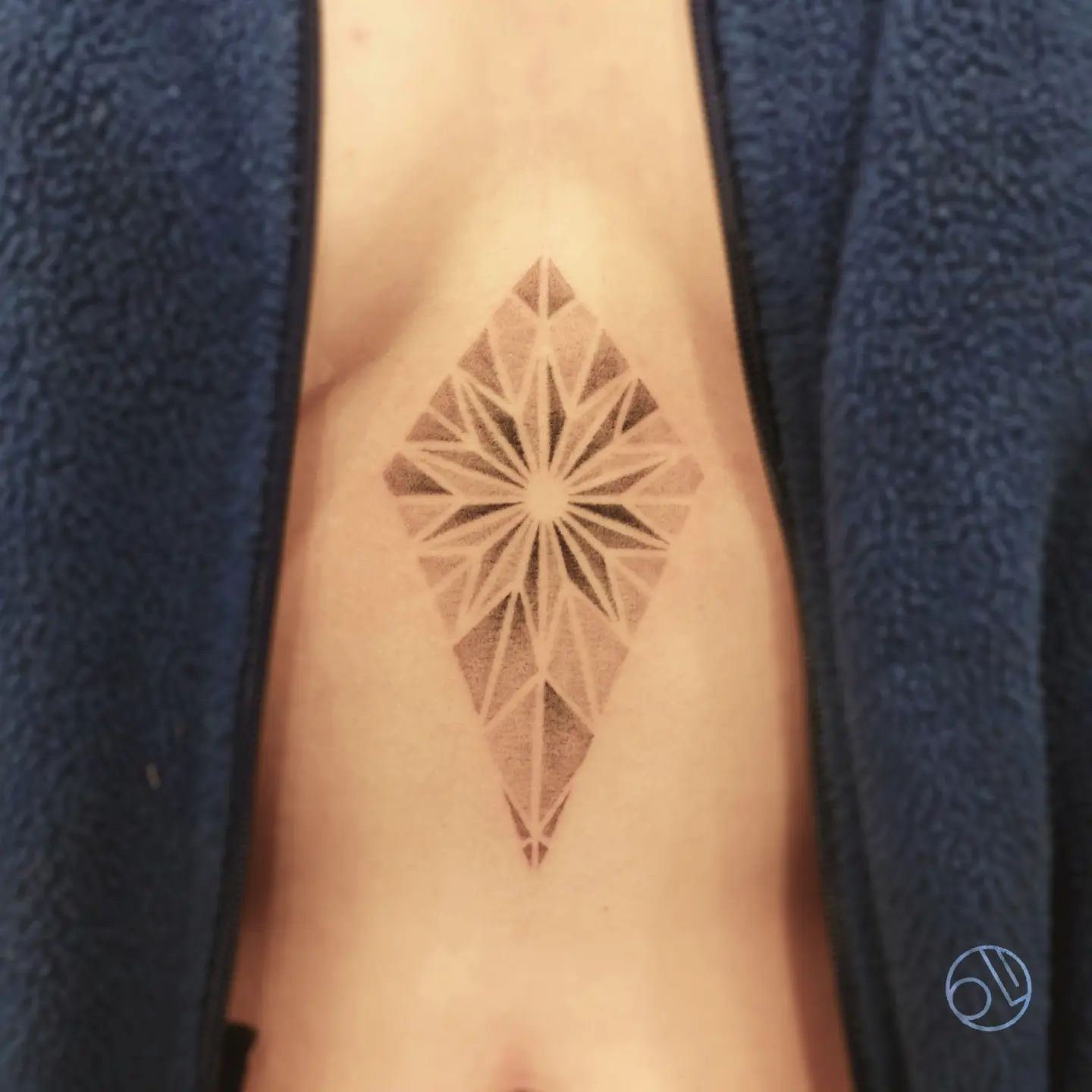 Flower mandala tattoo by monsieurolitattoo