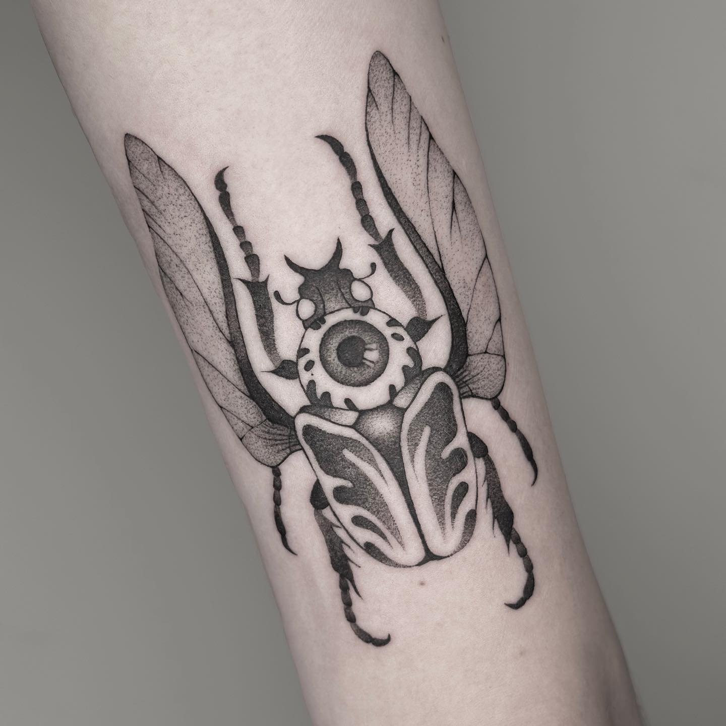 Insect tattoo on forearm by alabast too