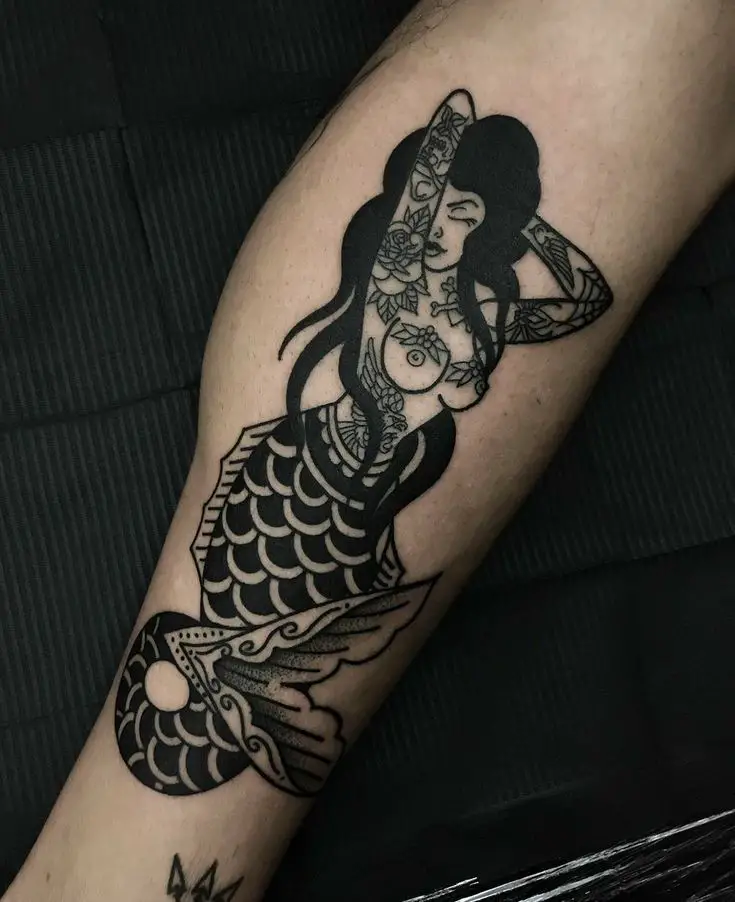 Mermaid traditional blackwork tattoo