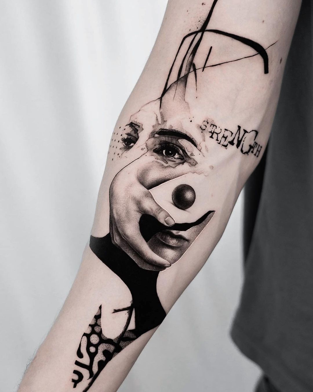 Portrait tattoo on arm by black.minimal.tattoo
