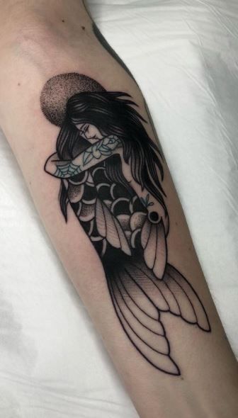 Traditional blackwork tattoo of mermaid