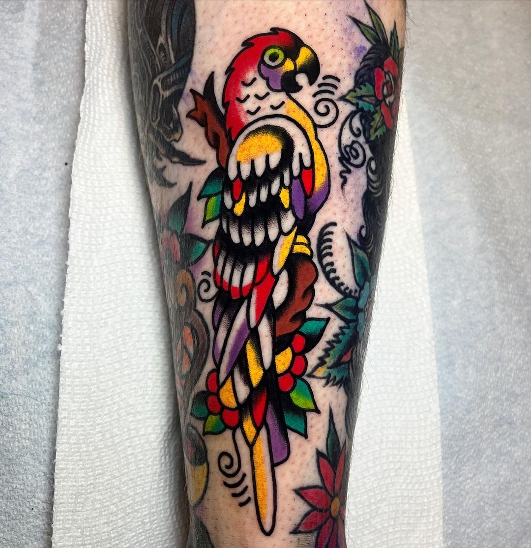 Traditional parrot tattoo by julianeelyislame