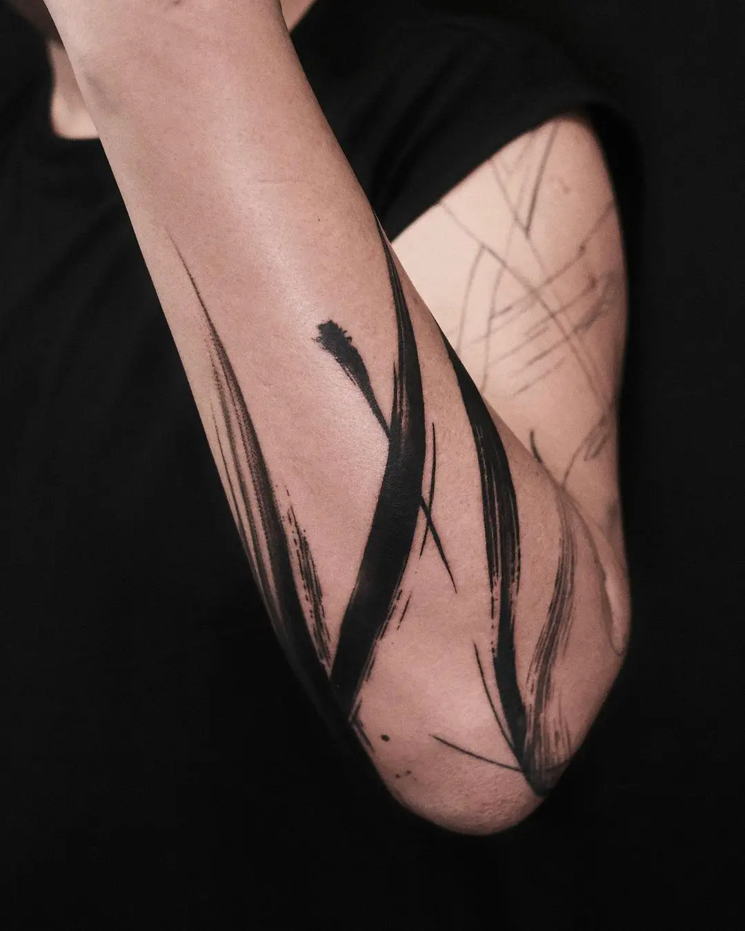 abstract tattoos by noir tattooer