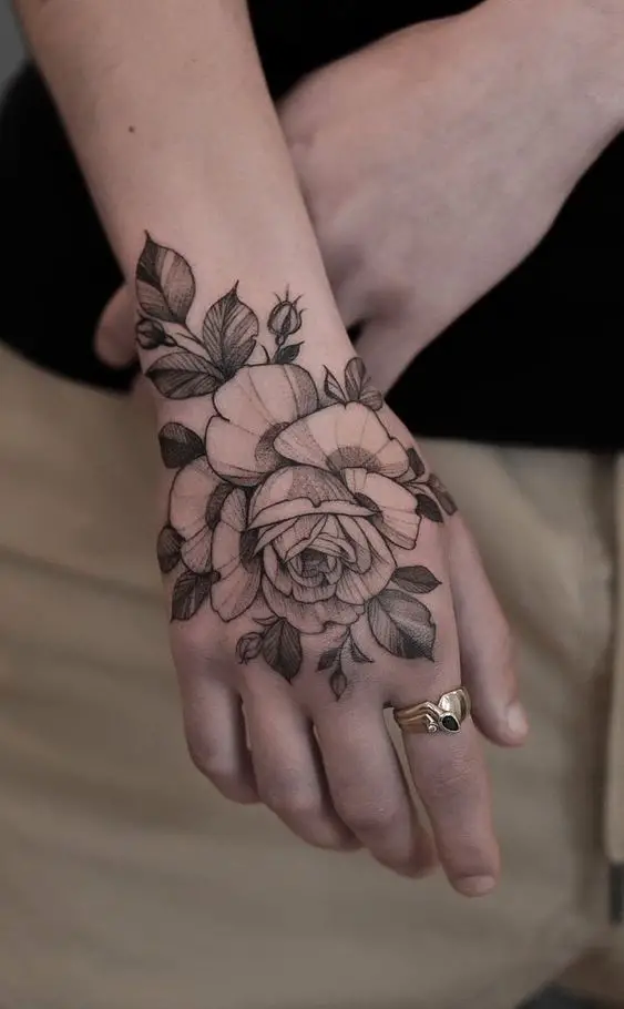beautiful flower tattoo on hand