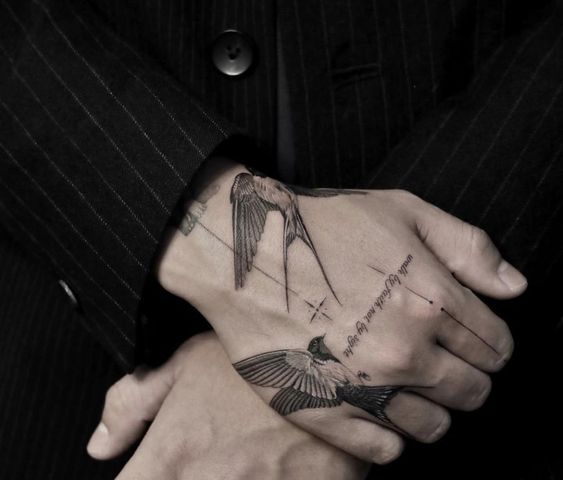 bird hand tattoos
