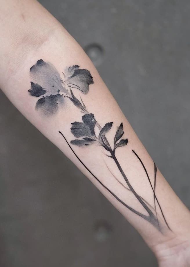 blackinked watercolor flower tattoo