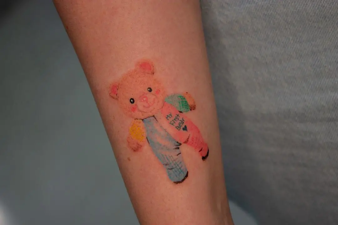colorful tattoo on arm by chu.tattoos