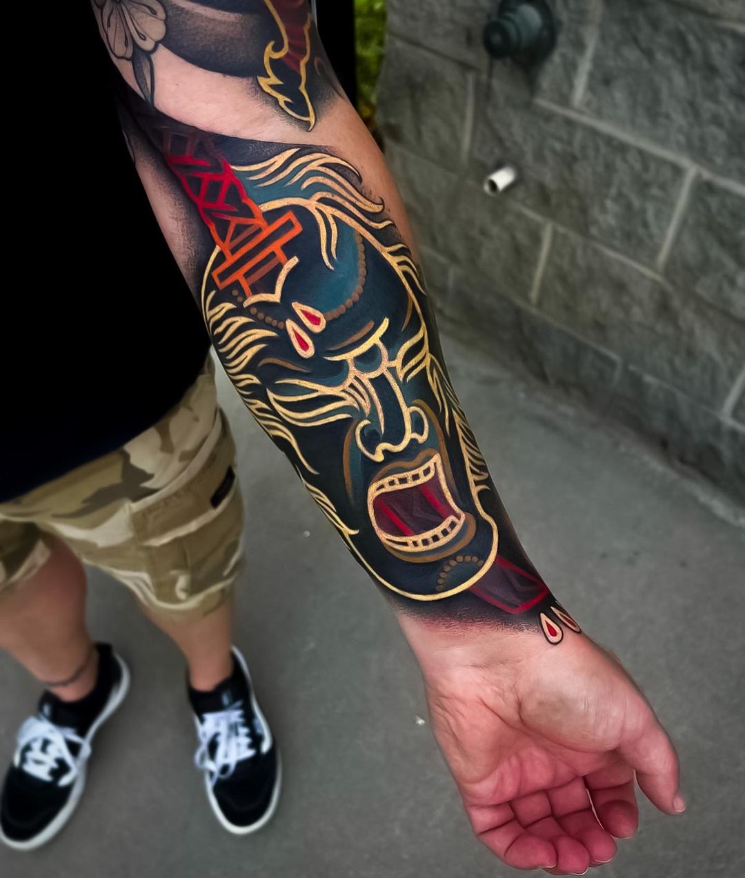 colorful tattoo on forearm by japanese.ink