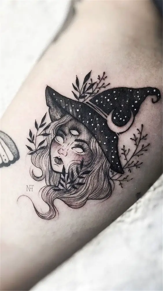 cute black inked witchy tattoo