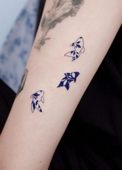 floral dolpin tattoo ideas