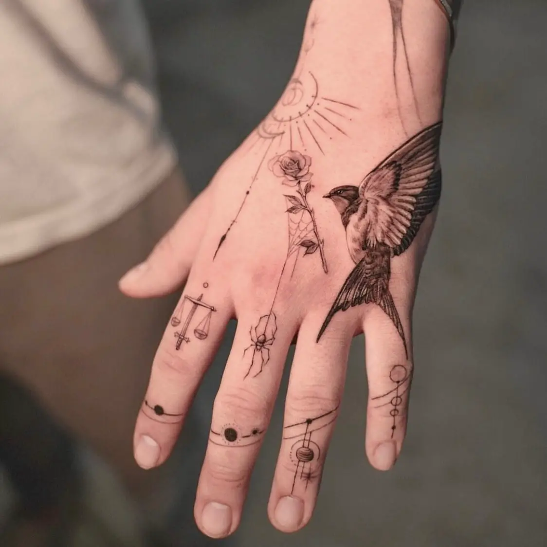 geometric hand tattoo by hood.seven .concepts