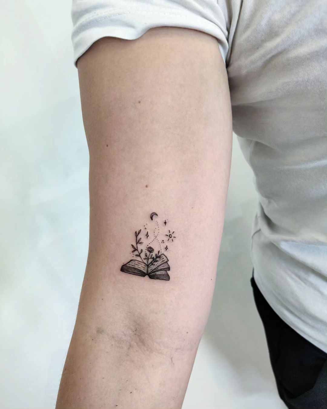 simple book tattoo by ag studiobrno