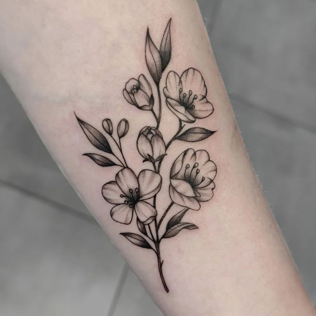 simple flower tattoo by kira tatts