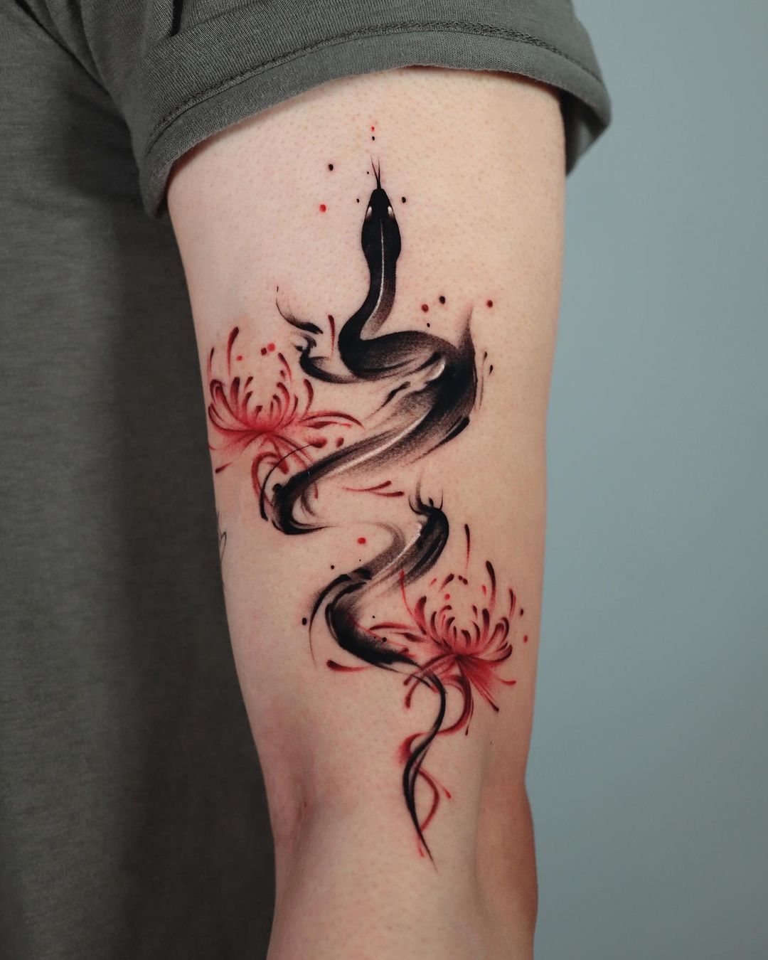snake sleeve tattoo by tattooist mate