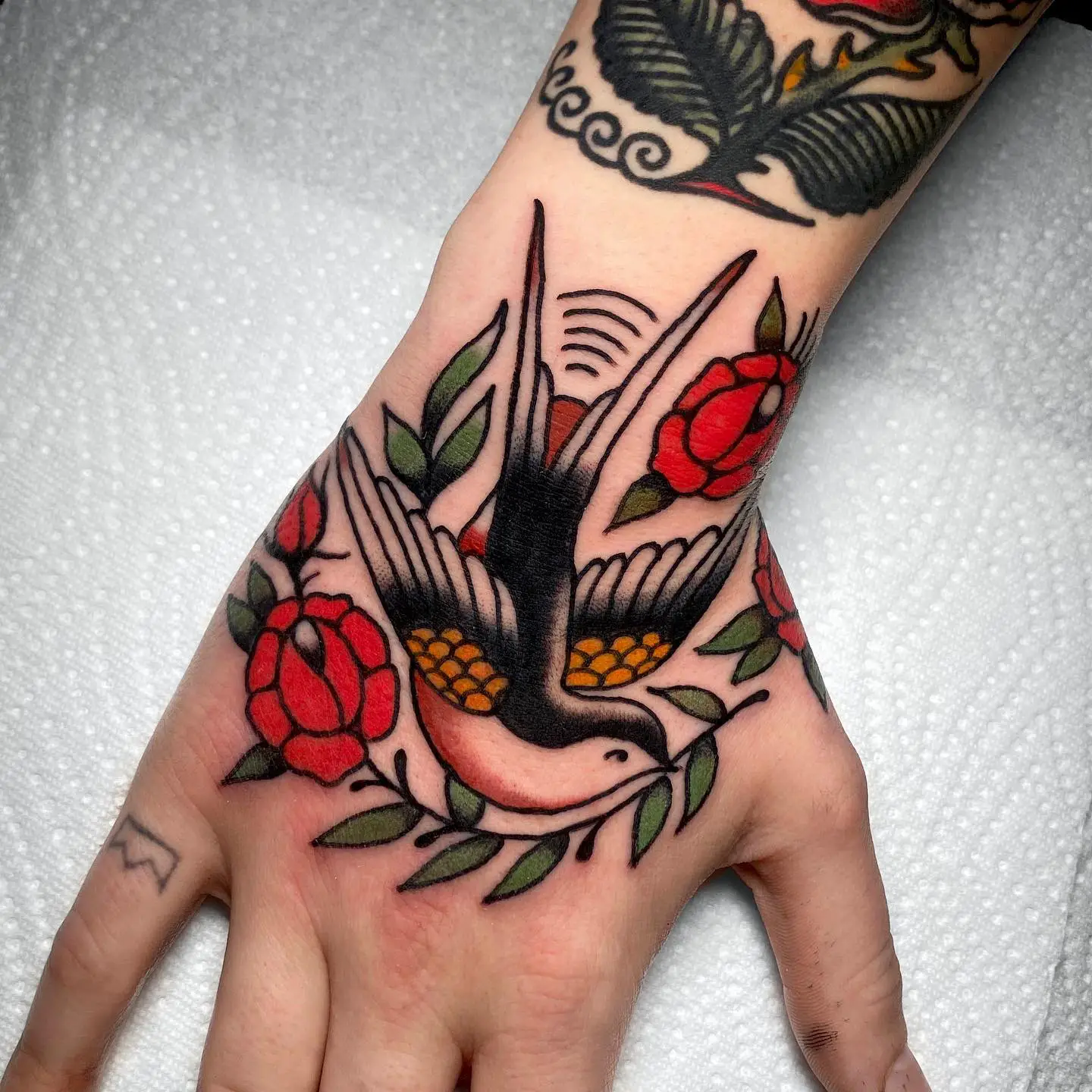 traditional hand tattoo design by team fullgas