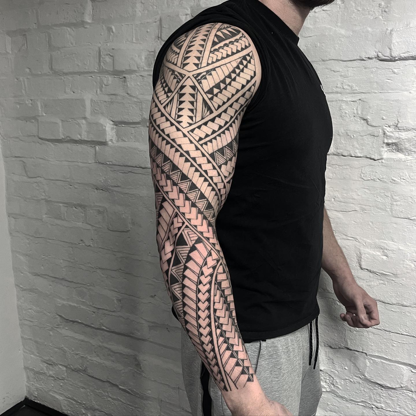 tribal sleeve tattoos for men by lewis davies tattooer
