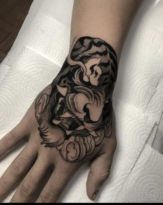 unique animal hand tattoo for men