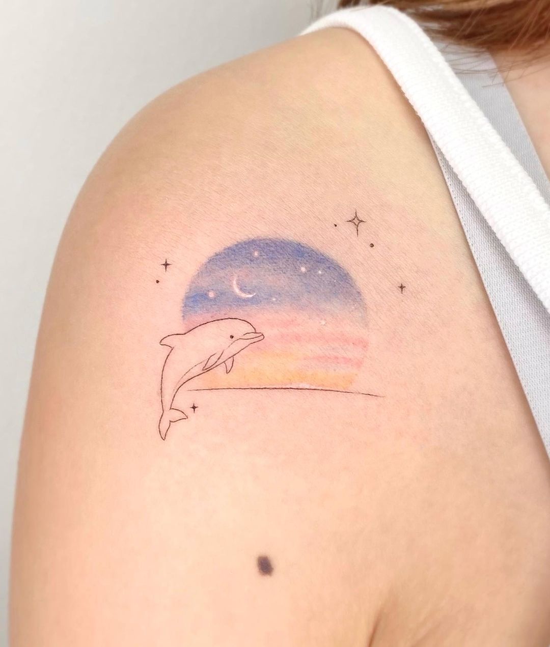 watercolor dolphin tattoo design by tattooist daone