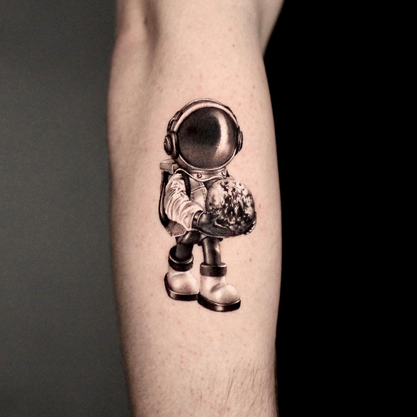 Astranaut tattoo on sleeve by chan hontattoo
