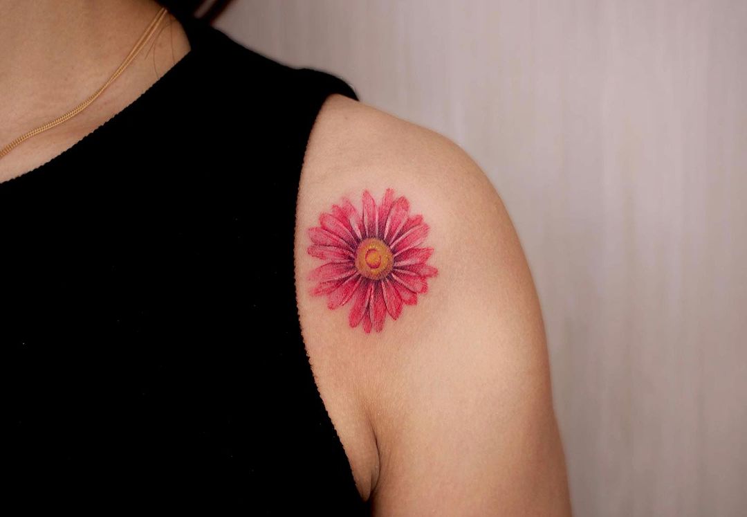 Daisy on shoulder tattoo by joo.ok .tattoo.kr