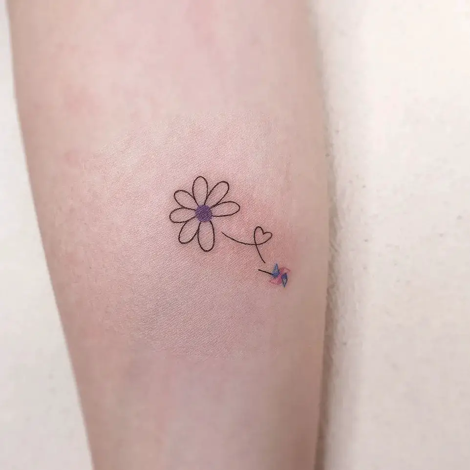 Daisy tattoos for men by gorae tattoo